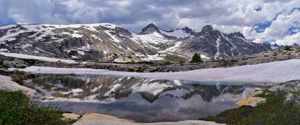 istock Upper and Lower Jean Lake in the Titcomb Basin along the Wind River Range, Rocky Mountains, Wyoming, views from backpacking hiking trail to Titcomb Basin from Elkhart Park Trailhead going past Hobbs, Seneca, and Island Lakes as well as Photographers point 1011297238