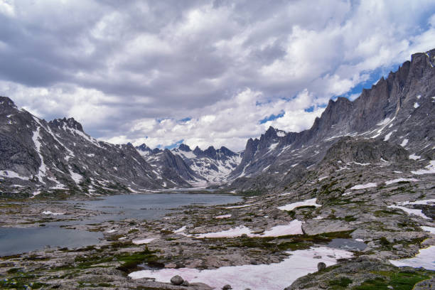 istock Upper and Lower Jean Lake in the Titcomb Basin along the Wind River Range, Rocky Mountains, Wyoming, views from backpacking hiking trail to Titcomb Basin from Elkhart Park Trailhead going past Hobbs, Seneca, and Island Lakes as well as Photographers point 1011297656