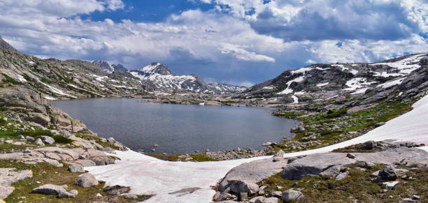 istock Upper and Lower Jean Lake in the Titcomb Basin along the Wind River Range, Rocky Mountains, Wyoming, views from backpacking hiking trail to Titcomb Basin from Elkhart Park Trailhead going past Hobbs, Seneca, and Island Lakes as well as Photographers point 1011298244