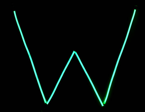 istock Green neon lights alphabet letters 1011304018