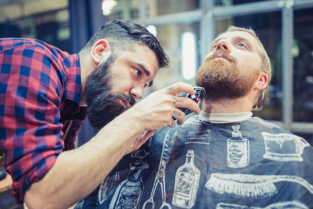 istock Ginger, bearded guy at the barber shop 1011304320