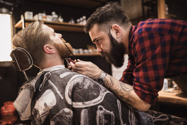 istock Ginger, bearded guy at the barber shop 1011304454