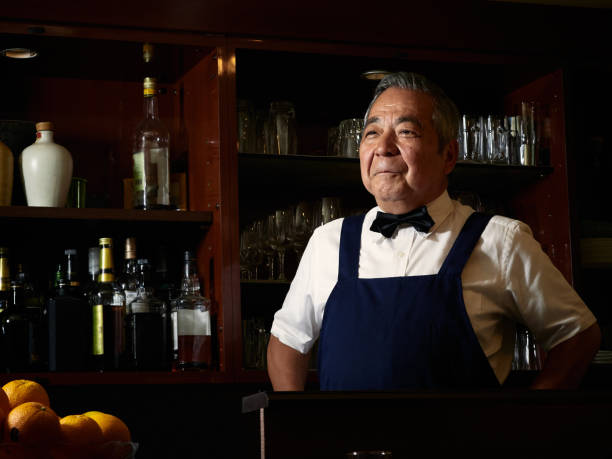 istock Older male bartender hospitality 1011313774