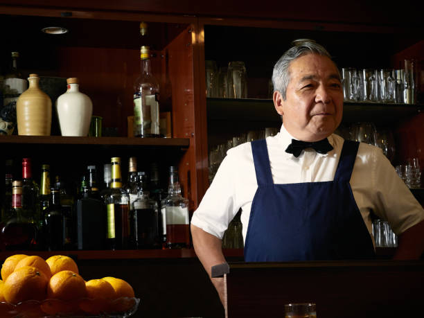 istock Older male bartender hospitality 1011313784