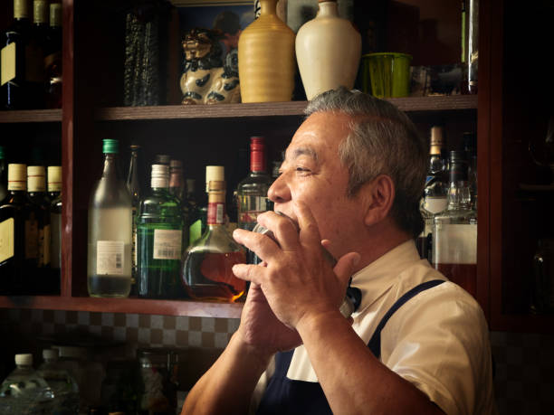 istock Older male bartender hospitality 1011313806