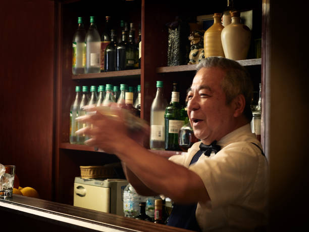 istock Older male bartender hospitality 1011313808