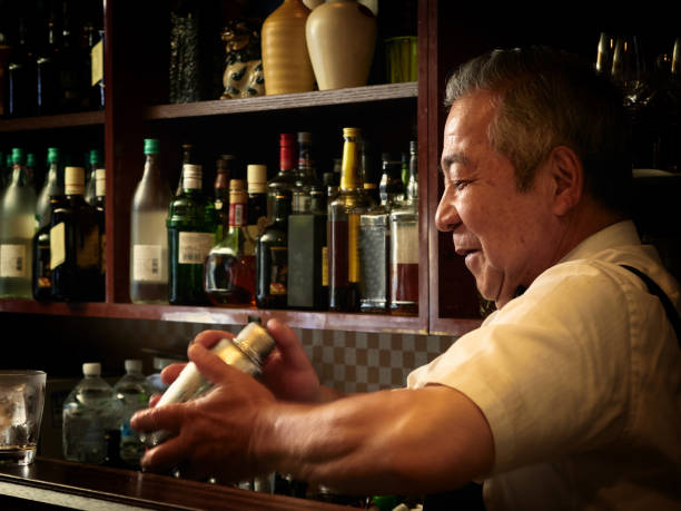 istock Older male bartender hospitality 1011313838