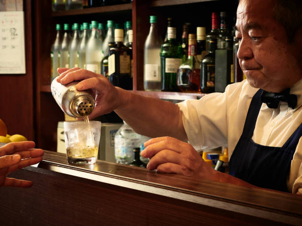 Older male bartender hospitality