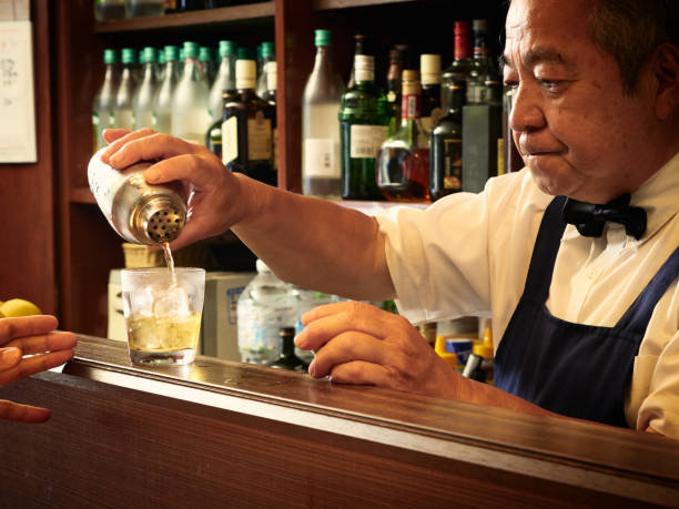 istock Older male bartender hospitality 1011313850