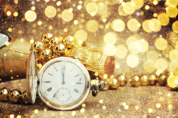 istock New Year Celebration, christmas tree background with bokeh. 1011313934