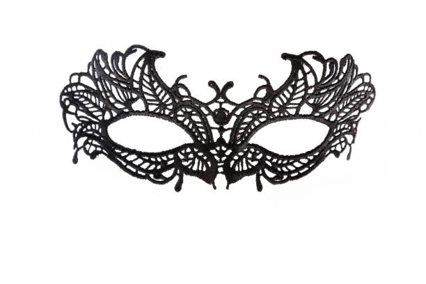 istock Black lace carnival mask isolated on white background 1011323326