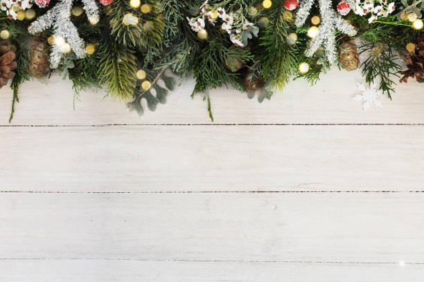 istock Christmas background on the white wooden desk 1011331796