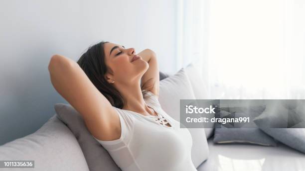 Woman Sleeping On Vacations In An Apartment Stock Photo - Download Image Now - Inhaling, Domestic Life, Breathing Exercise