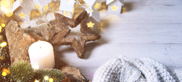 istock Cosy and soft winter background, knitted sweater and lights 1011344220