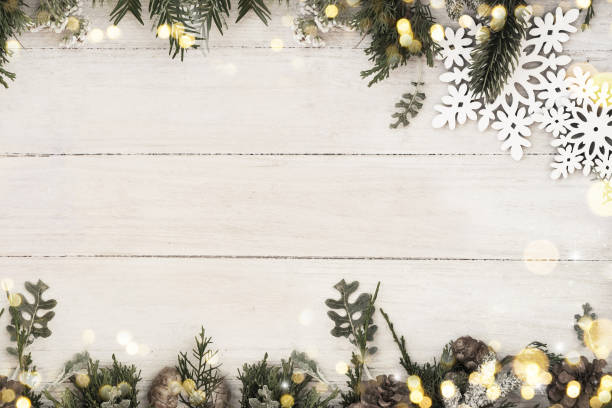 istock Christmas background on the white wooden desk 1011344548