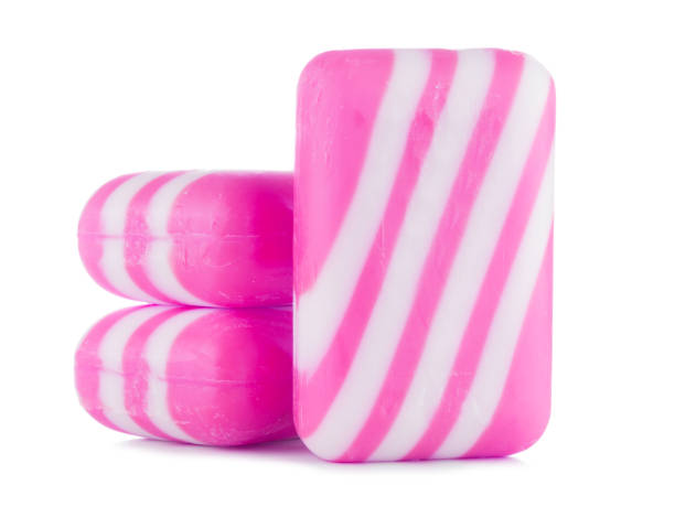 istock group of pink soap Isolated on white background 1011349676