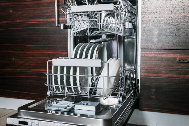 istock clean dishes and Cutlery in the dishwasher 1011361046