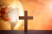 istock The Cross of Christ and an Antique Globe 1011361204