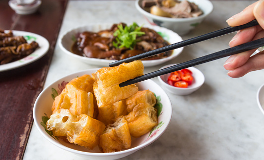 Chinese donut or chinese bread stick. Stewed pork and Bak Kut Teh on the table in singapore