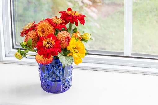 Home style fall bouquet with garden flowers.