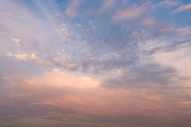 istock Beautiful sunset sky background with blue and pink clouds. 1011375846