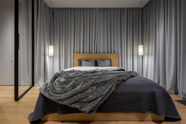 istock Luxurious bedroom with double bed 1011376870