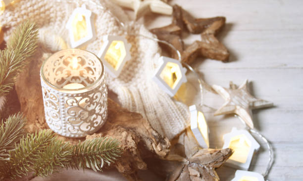 istock Cosy and soft winter background, knitted sweater and lights 1011383330