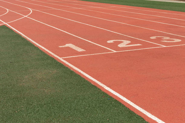 istock Grass soccer field and track 1011403720