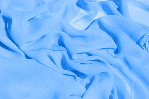 istock Background texture, pattern. Azure Blue Silk Twill. Here is a deluxe azure blue silk twill perfect for a vast array of applications. Almost as soft as a cloud, this remarkable silk has a supreme drape 1011408340