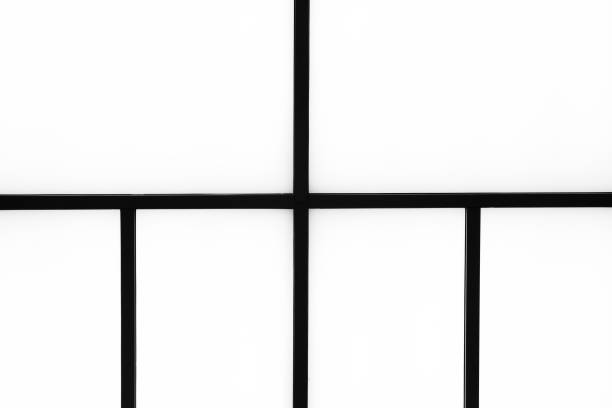 Abstract geometric black stripes on a bright white background, minimalism, abstract black and white background.
