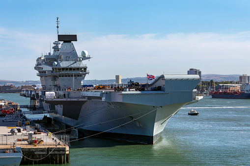 Aerial view of naval ship travelling in San Diego Bay, San Diego, California, USA.