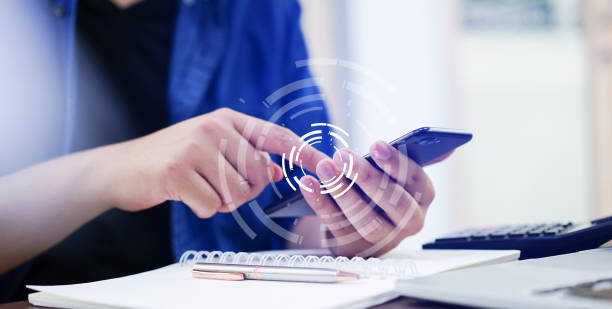 close up man hand holding smartphone and touch on screen for search information with virtual circle wheel future technology concept