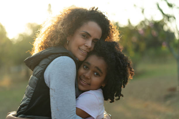 istock Daughter and Mother Embracing 1011418858