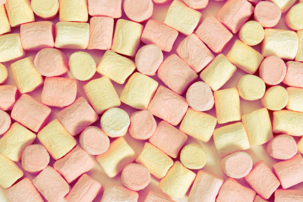 tło ze słodkich różowych marshmallows. - dulcet zdjęcia i obrazy z banku zdjęć