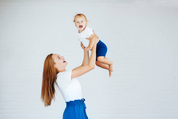 istock Young mother with her little son 1011437246