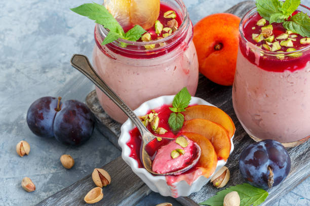 istock Homemade plum ice cream with pistachios and mint. 1011437962