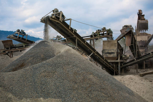 istock Heavy machinery at the quarry. 1011442250