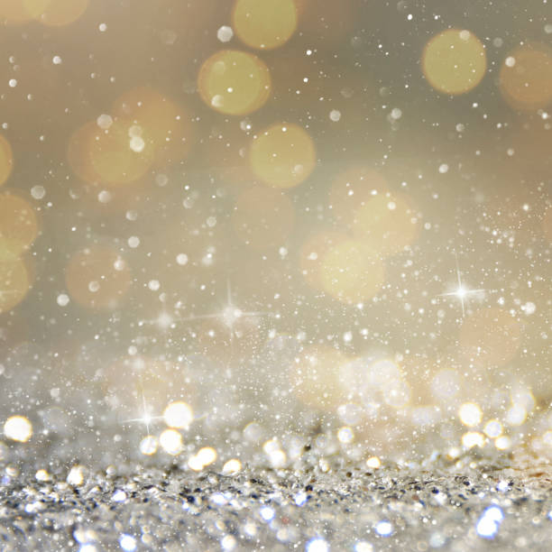 istock Christmas light background.  Holiday glowing backdrop. Defocused Background With Blinking Stars. Blurred Bokeh. 1011451460