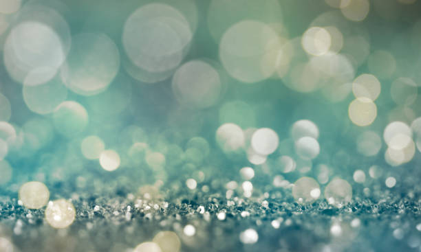 istock Christmas light background.  Holiday glowing backdrop. Defocused Background With Blinking Stars. Blurred Bokeh. 1011451714