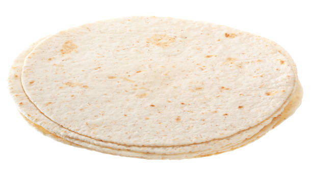 istock White tortillas isolated on white background. 1011452002