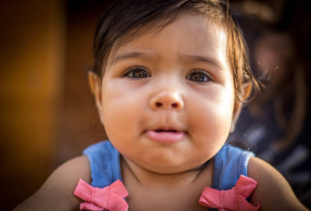istock the baby looks in the camera 1011455370