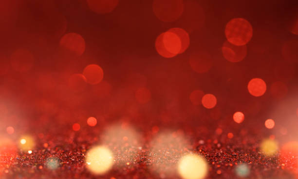 istock Christmas light background.  Holiday glowing backdrop. Defocused Background With Blinking Stars. Blurred Bokeh. 1011455942