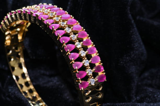 istock Fancy Solitaire American diamond bracelet macro closeup image with black background 1011456066
