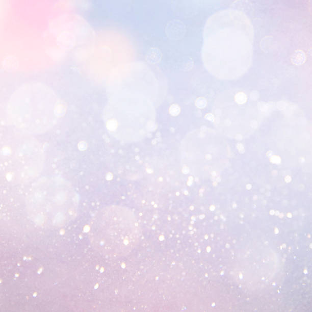 istock Blurred bokeh light background, Christmas and New Year holidays background 1011456390