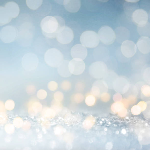 istock Christmas light background.  Holiday glowing backdrop. Defocused Background With Blinking Stars. Blurred Bokeh. 1011461372