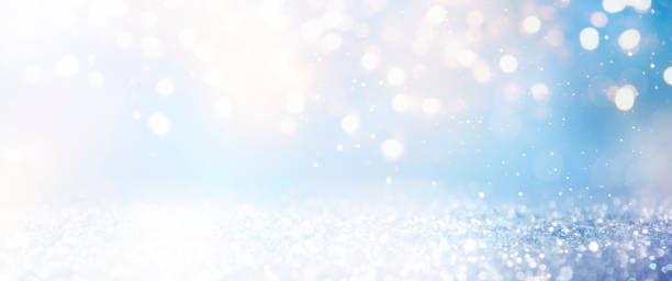istock Christmas light background.  Holiday glowing backdrop. Defocused Background With Blinking Stars. Blurred Bokeh. 1011461580