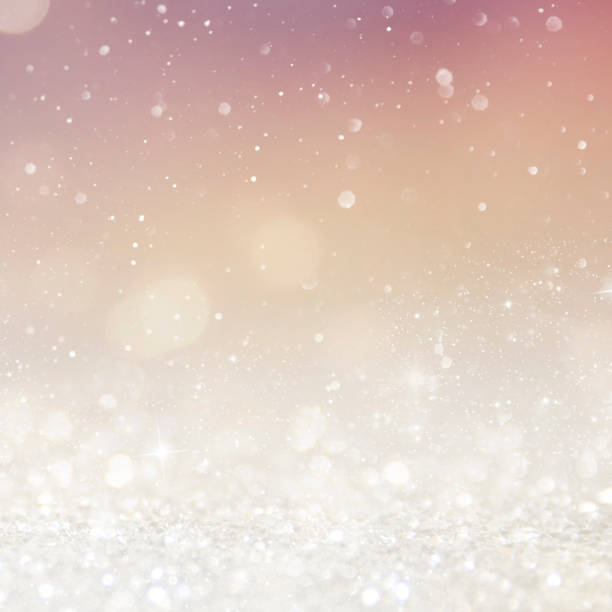 istock Christmas light background.  Holiday glowing backdrop. Defocused Background With Blinking Stars. Blurred Bokeh. 1011461904