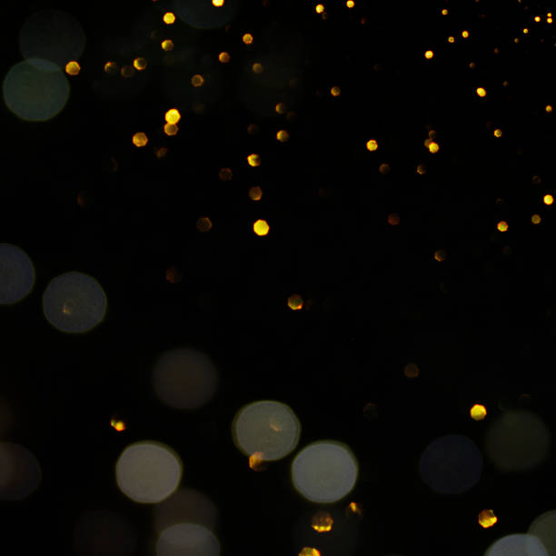 istock Christmas light background.  Holiday glowing backdrop. Defocused Background With Blinking Stars. Blurred Bokeh. 1011462014