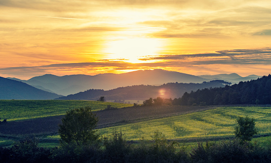 beautiful sunset landscape over the hills