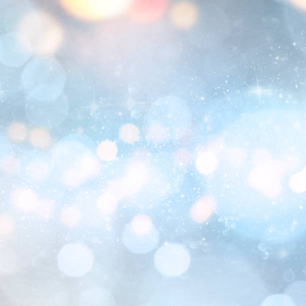 istock Christmas light background.  Holiday glowing backdrop. Defocused Background With Blinking Stars. Blurred Bokeh. 1011467872